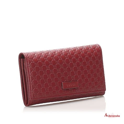 billetera roja gucci